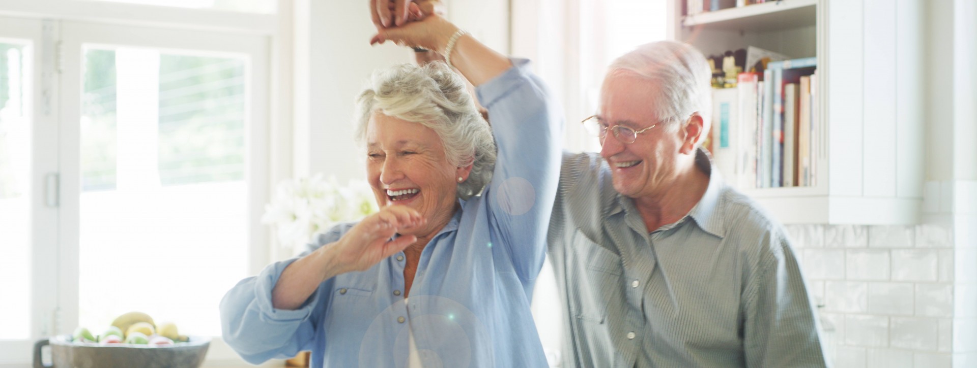 Older Couple Dancing in Kitchen